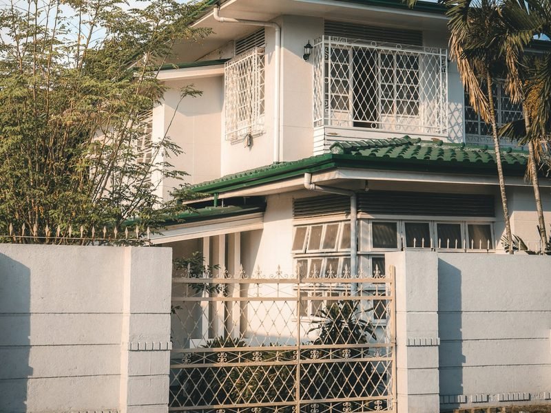 A home with a gate and compound wall